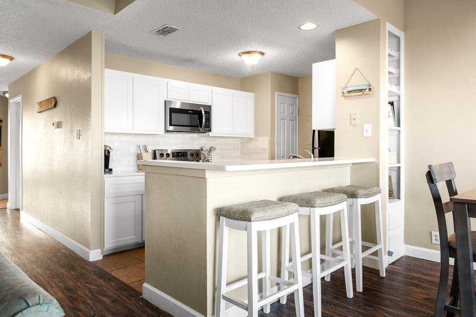 Condo, Multiple Beds, Hot Tub (Spinnaker 317) | Private kitchen | Coffee/tea maker, dining tables