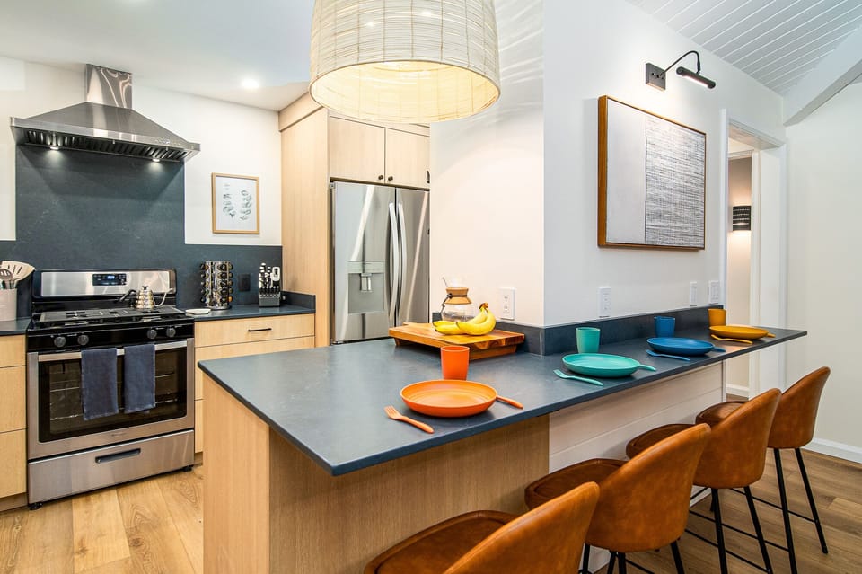 Fully stocked kitchen with family style dining room