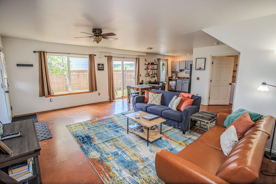 Main floor features modern concrete floors with in-floor heat in winter.