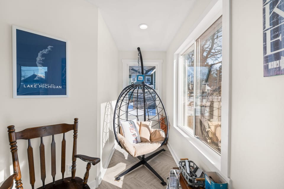Cozy up to catch some sun off of the dining room. Grill supplies included and stocked here as well, along with a bluetooth speaker.