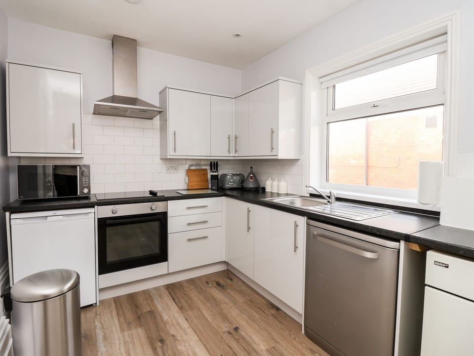 Fridge, dishwasher, electric kettle, toaster