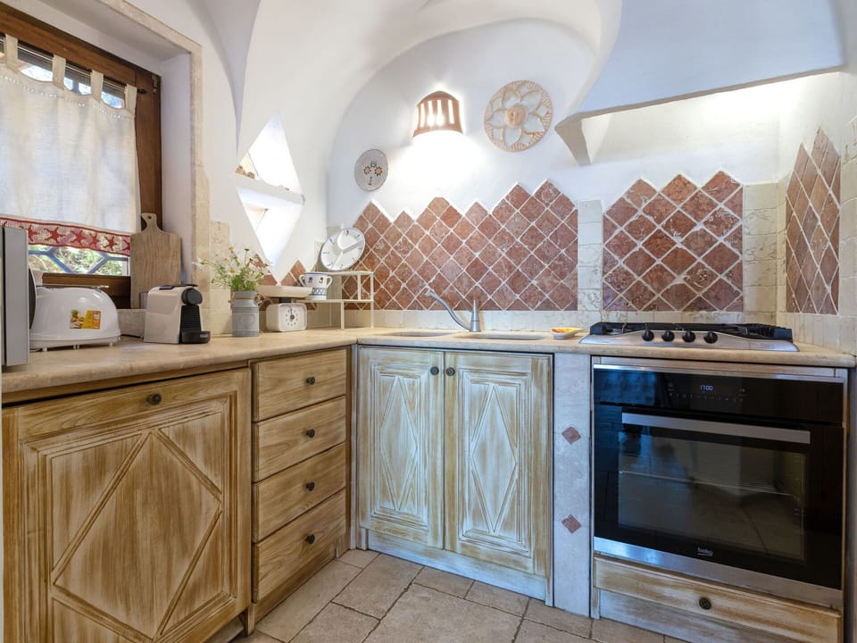 Kitchen, Interior Design, Countertop, Flooring, Ceiling, Kitchen Appliance, Major Appliance, Cabinetry, Kitchen Stove, Tile