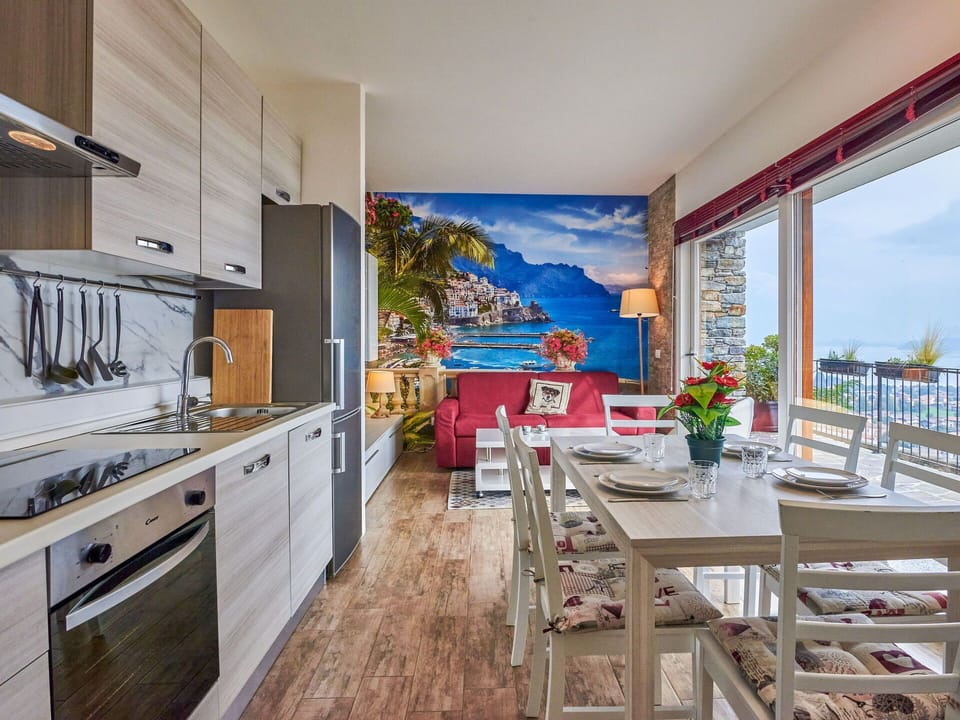 Cabinetry, Furniture, Property, Countertop, Building, Kitchen, Table, Wood, Tap, Interior Design