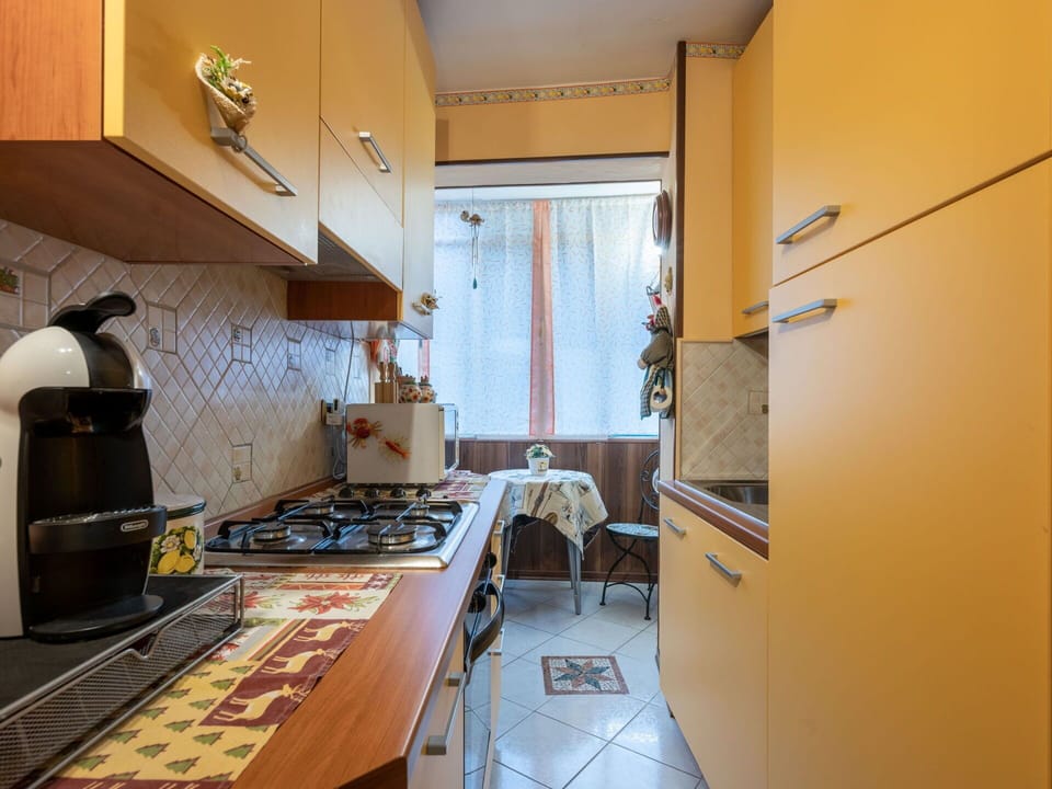 Table, Countertop, Interior Design, Wood, Gas Stove, Kitchen Appliance, Cabinetry, Kitchen, Flooring, Kitchen Stove