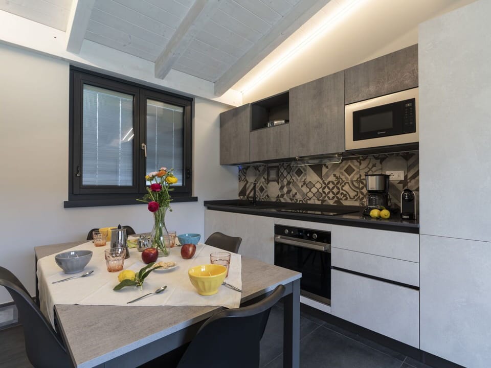 Furniture, Table, Cabinetry, Property, Building, Countertop, Window, Kitchen Stove, Interior Design, Kitchen