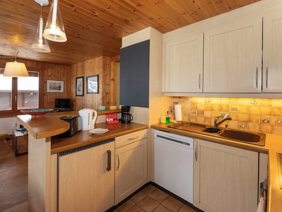 Kitchen, Countertop, Furniture, Cabinetry, Kitchen Appliance, Interior Design, Wood, Major Appliance, Flooring, Ceiling