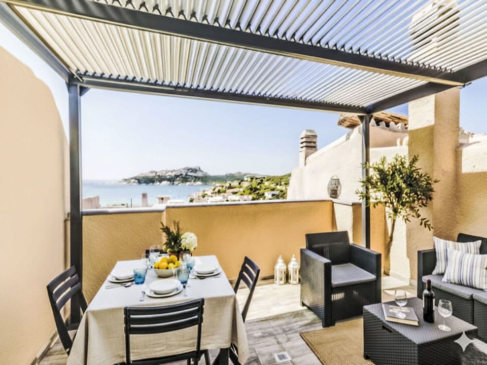 Furniture, Shade, Outdoor Furniture, Chair, Balcony, Awning, Resort, Patio, Eco Hotel, Houseplant