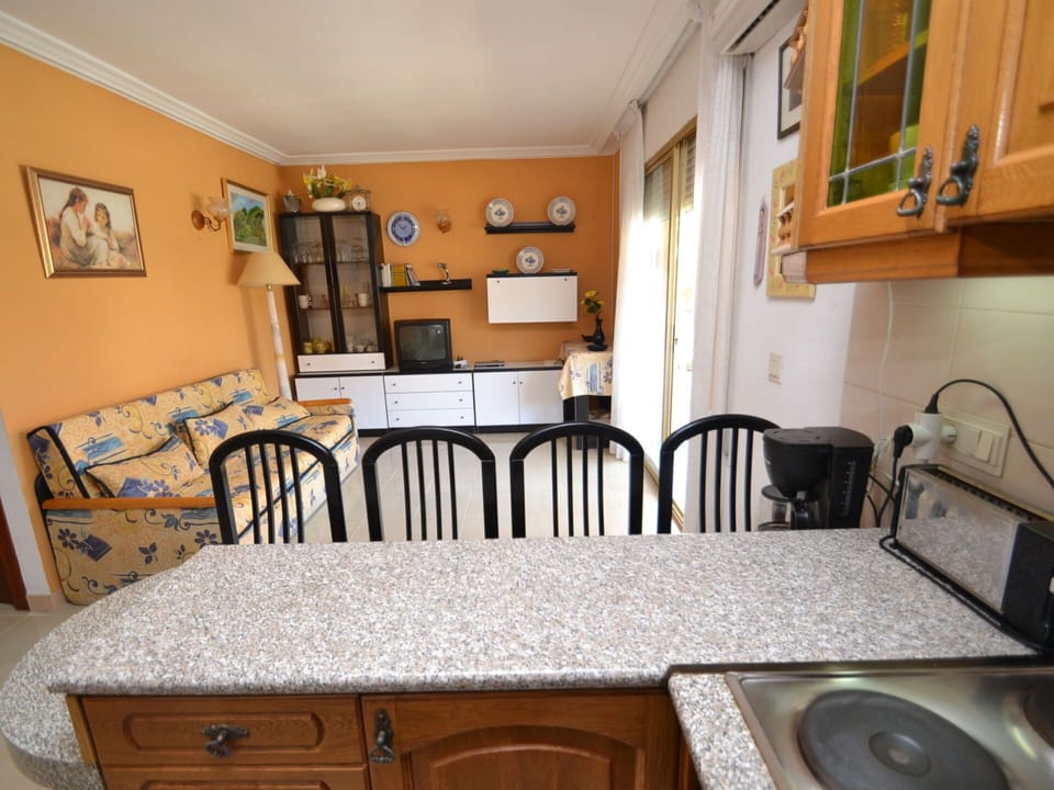 Furniture, Property, Picture Frame, Cabinetry, Table, Chair, Wood, Interior Design, Floor, Flooring