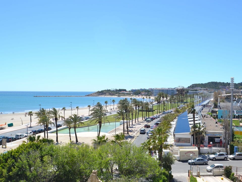 Sky, Water, Plant, Tree, Car, Building, Beach, Coastal And Oceanic Landforms, Arecales, Landscape