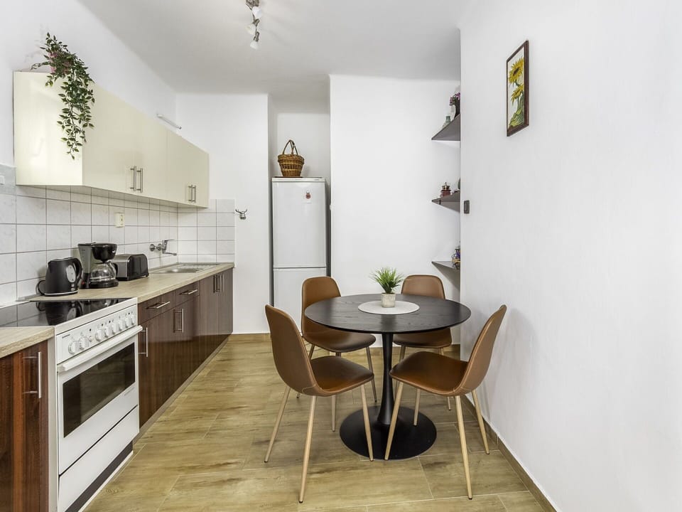 Table, Furniture, Picture Frame, Cabinetry, Countertop, Chair, Lighting, Wood, Interior Design, Architecture