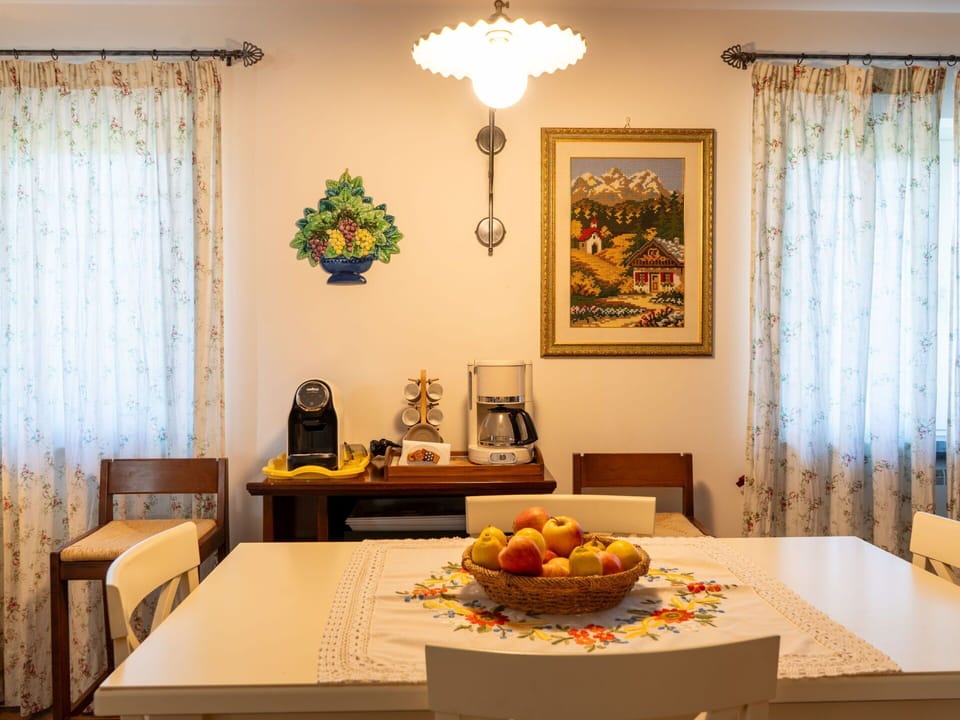 Table, Property, Furniture, Tableware, Curtain, Orange, Decoration, Textile, Lighting, Interior Design