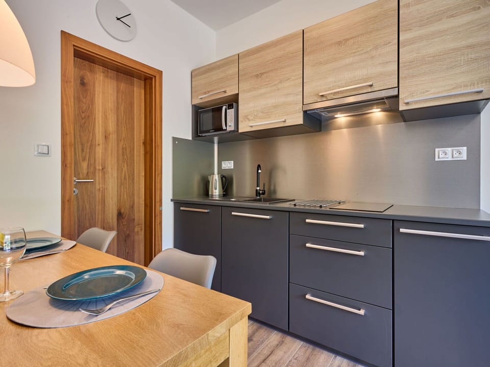 Cabinetry, Furniture, Building, Property, Countertop, Chair, Table, Wood, Drawer, Kitchen