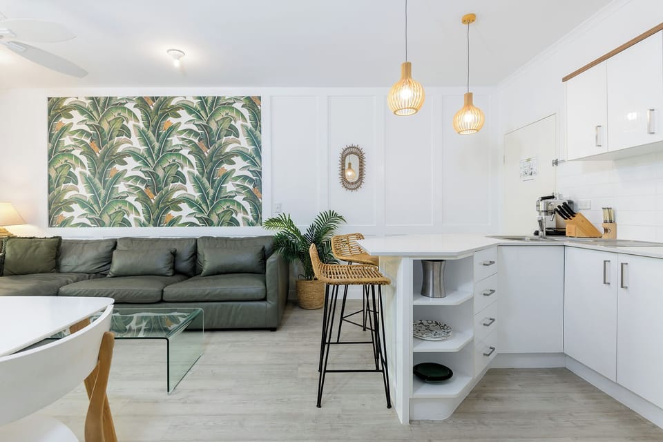 Lounge, dining and kitchen spaces