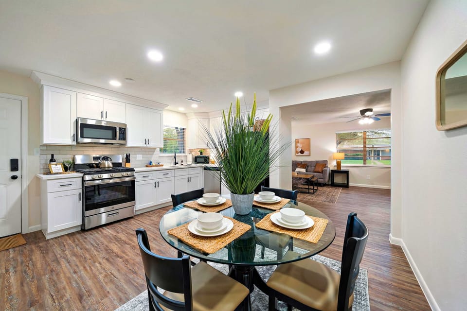 Dining Area: Gather around the stylish table and indulge in delightful meals with friends!