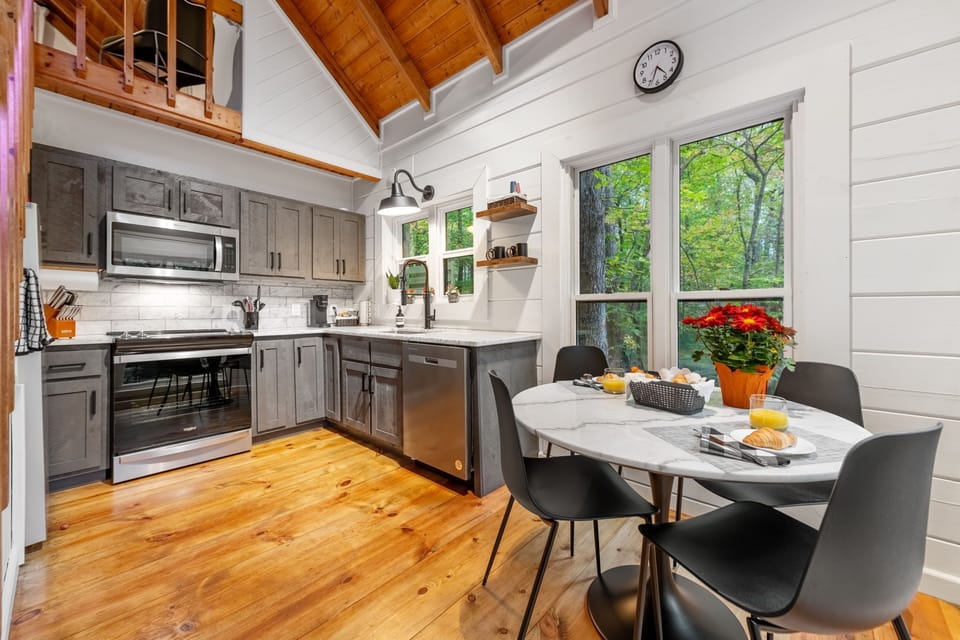 A fully stocked kitchen ready for your every meal and a cozy breakfast nook perfect for sharing a meal with loved ones.