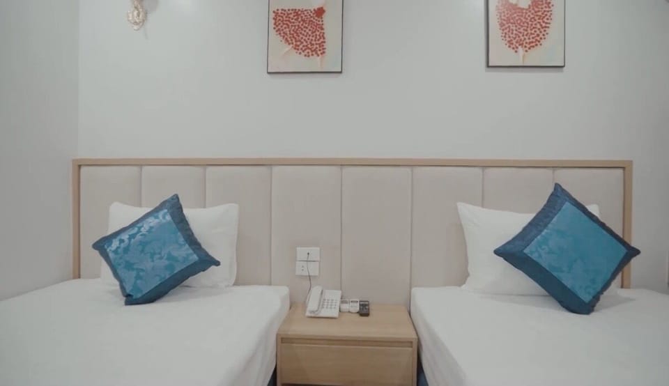 Family Triple Room | Free minibar items, free WiFi, bed sheets