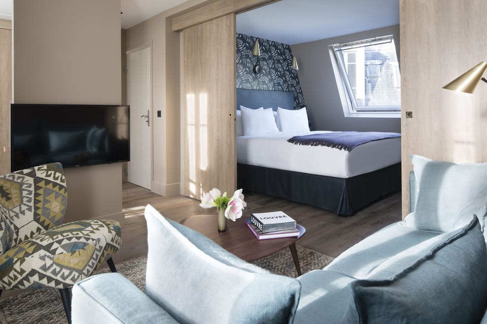 Family Suite | In-room safe, desk, blackout drapes, soundproofing