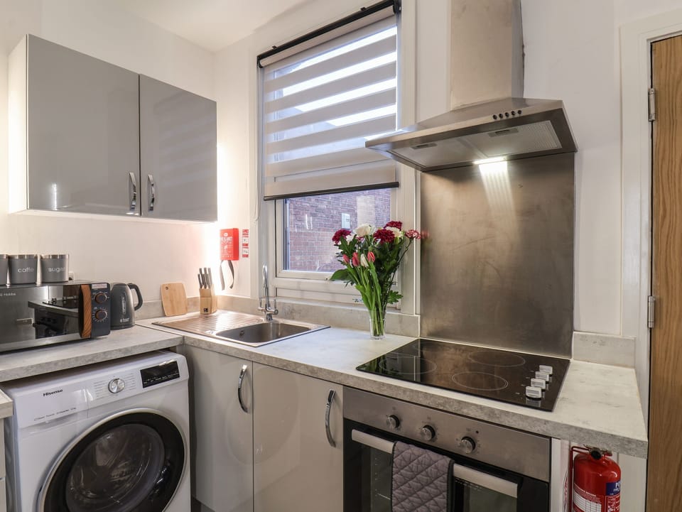 Fridge, electric kettle, toaster, cookware/dishes/utensils