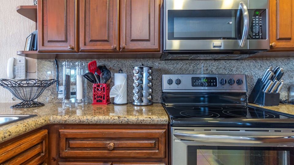 Fully Stocked Kitchen with Stainless Steel Appliances