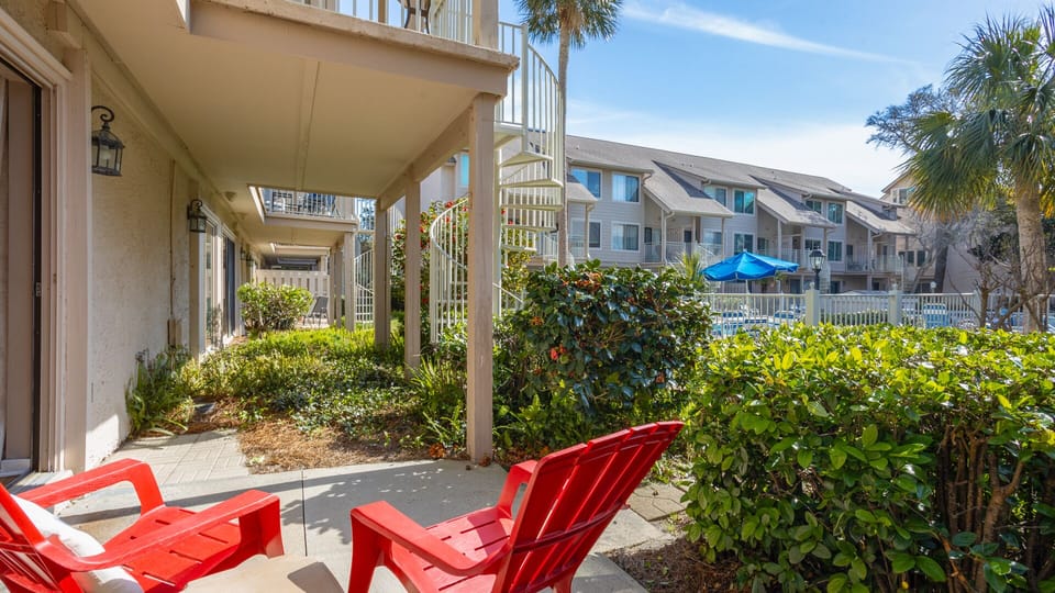 The patio extends your living space outdoors, offering a comfortable spot for dining, morning coffee, or relaxing after a day at the beach.