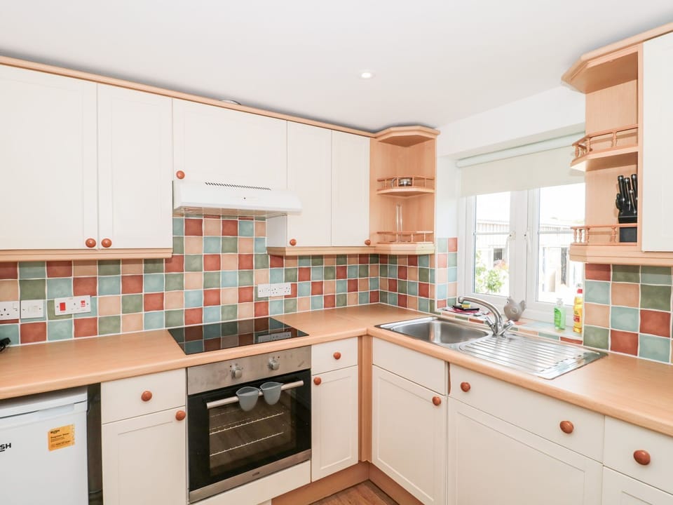 Fridge, dishwasher, electric kettle, toaster