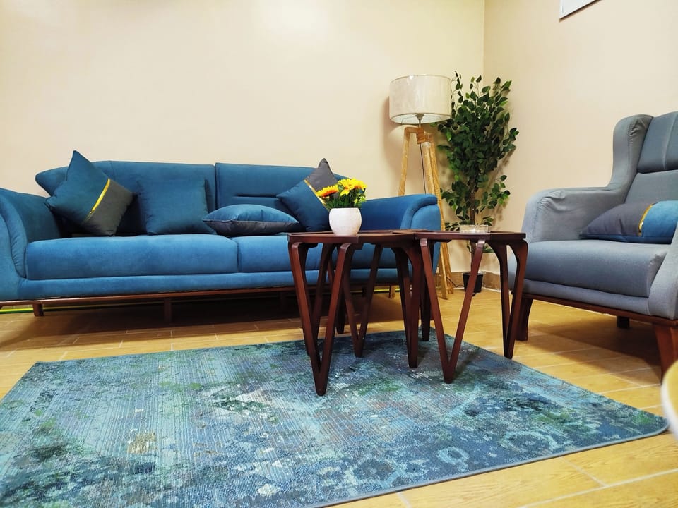 Family Apartment, 3 Bedrooms | Living area | 43-inch Smart TV with satellite channels, Netflix, DVD player