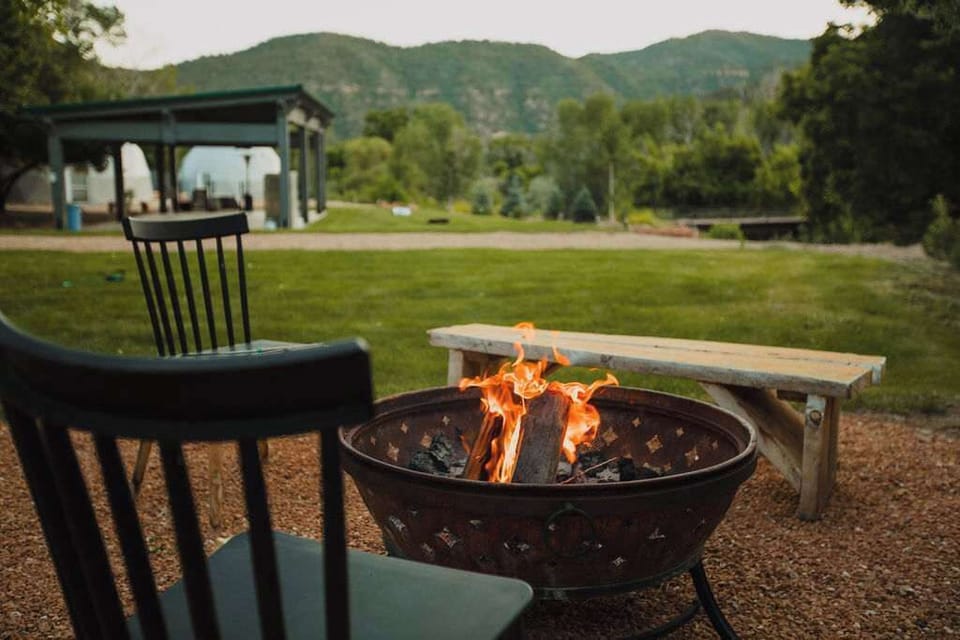 Starry nights and cozy conversations await around our communal fire pit. Make new friends and enjoy the warmth.