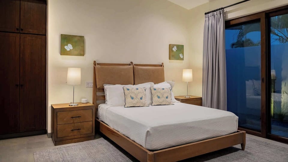 Bedside tables and lamps as well as room-darkening curtains
