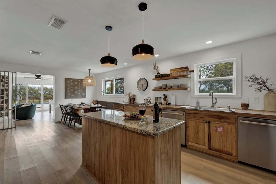 Full kitchen with dining area.