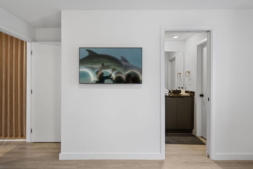 The room features decorative details and a private bathroom.