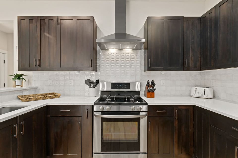 Chef's Kitchen | Stainless Steel Appliances and Breakfast Bar