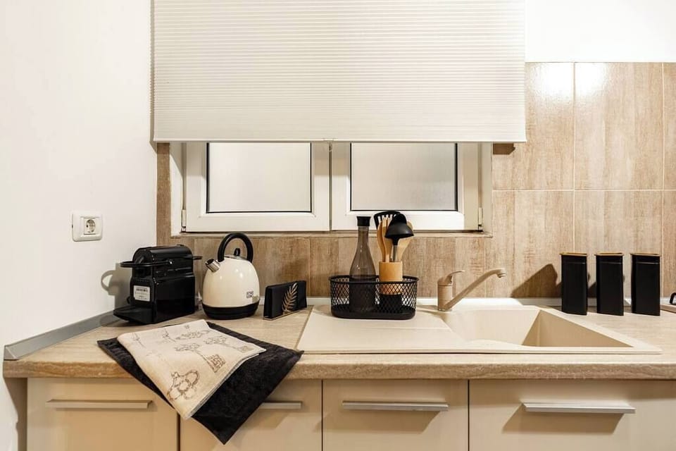 Discover culinary bliss in our expansive kitchen, boasting state-of-the-art appliances and abundant countertop space, providing the perfect canvas for bringing your culinary visions to life.
