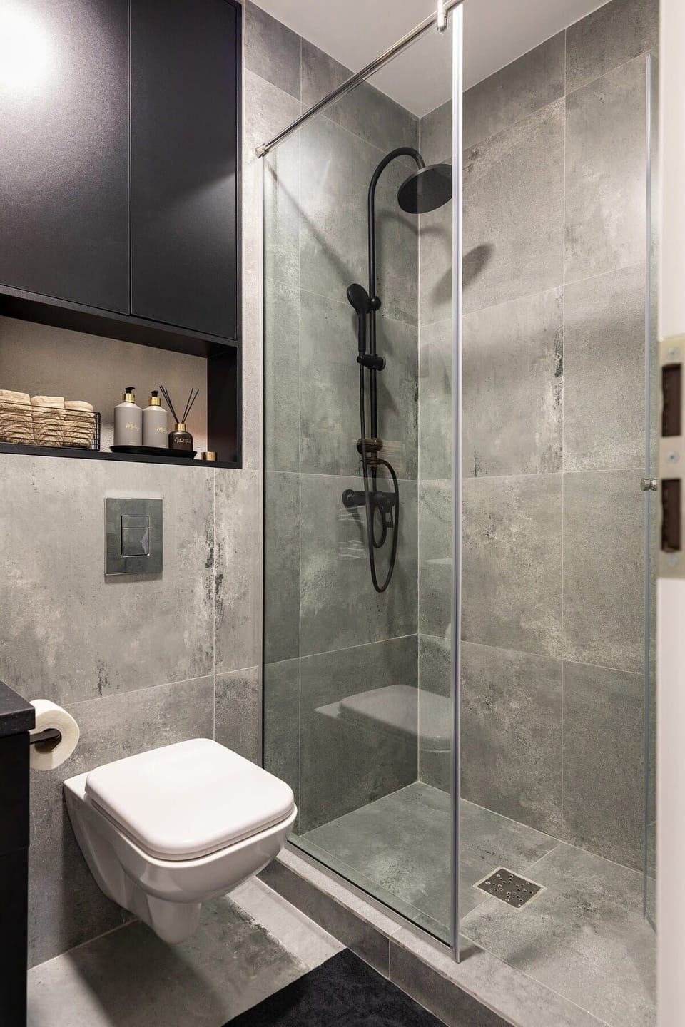Dive into a fleeting yet refined experience, as our modern bathroom serves as a brief indulgence in luxury.