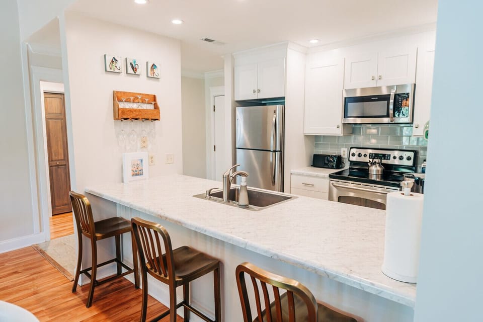 Open and entertaining kitchen perfect for home cooked meals or takeout