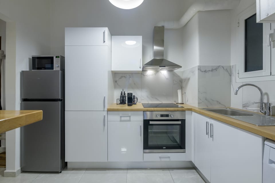Comfort Apartment | Private kitchen | Full-size fridge, microwave, oven, dishwasher