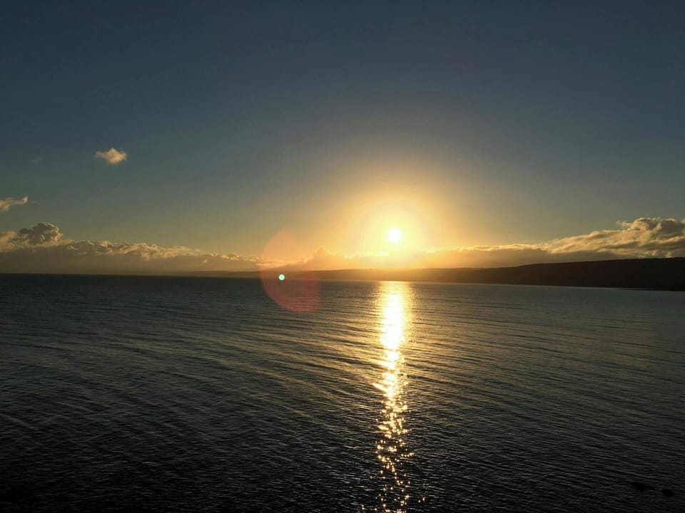 Sunset over the sea at New Quay