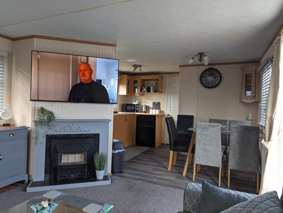 Cabin | Living area | TV, fireplace