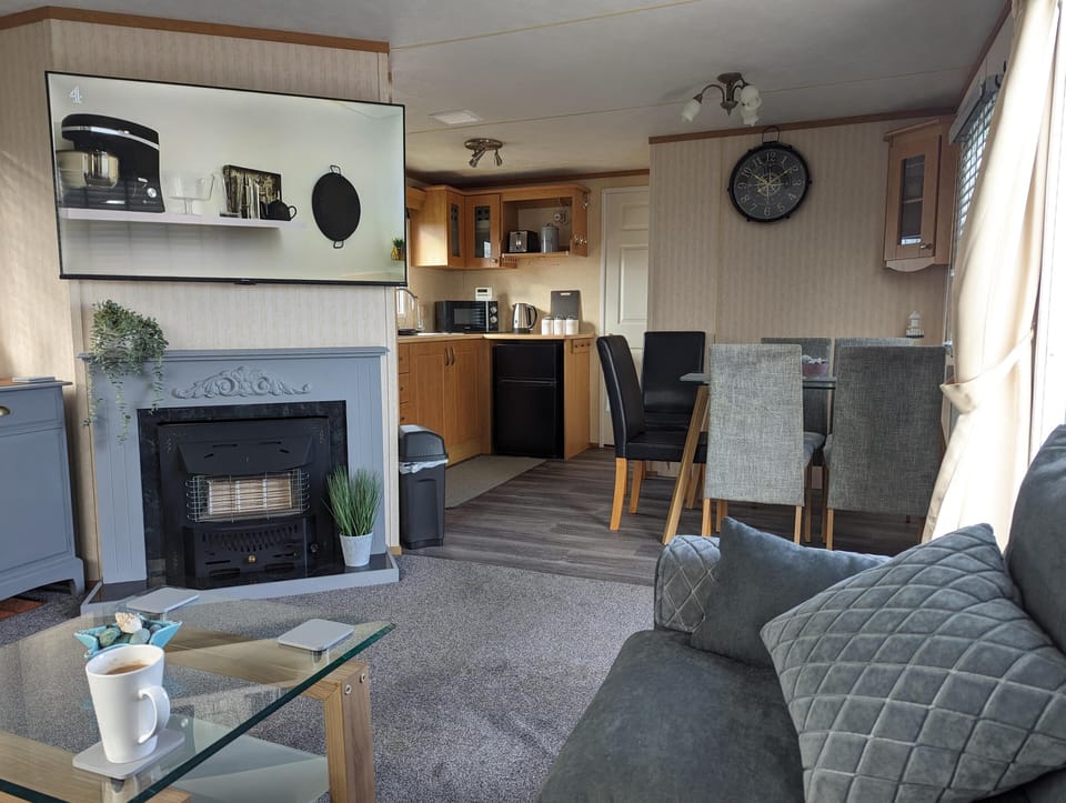 Cabin | Living area | TV, fireplace