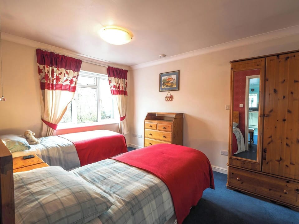 Single beds Large wardrobe with mirror.