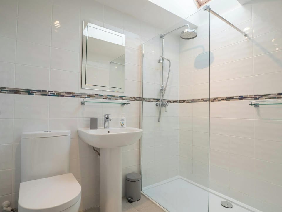 Shower room with walk in shower, toilet and sink