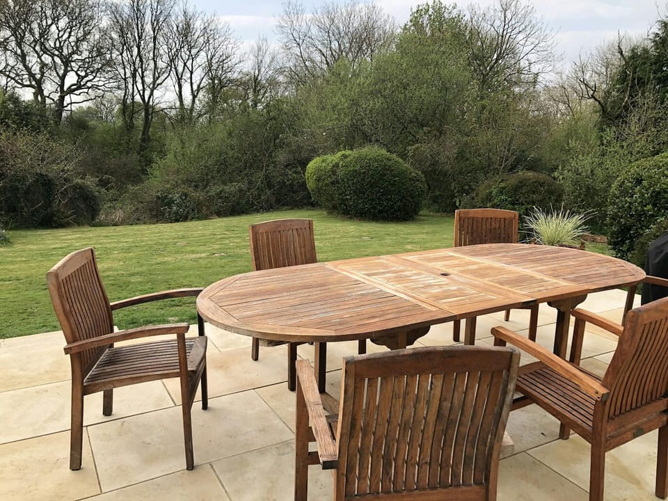 Large terrace with wooden table and 6 chairs