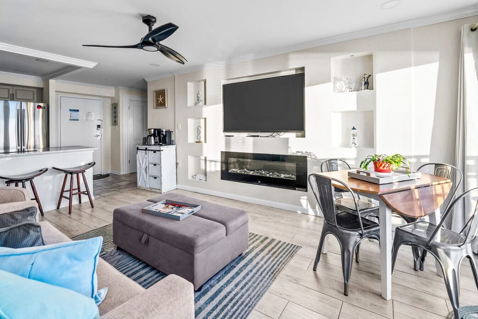 Spacious, airy, and beautifully decorated this living room invites you to sit back and savor the calm.