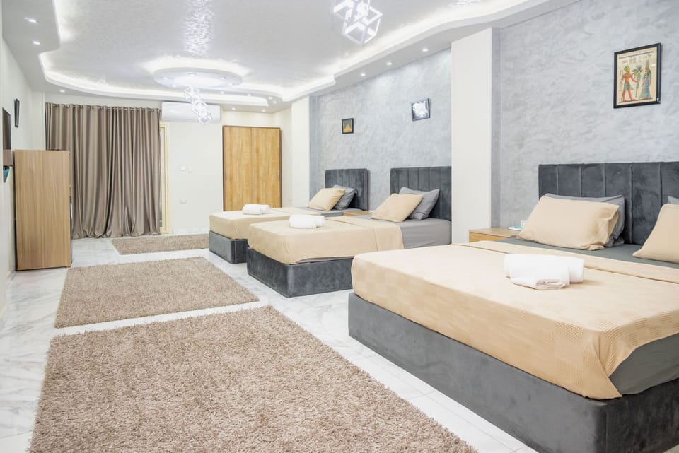 Signature Quadruple Room | Egyptian cotton sheets, premium bedding, down comforters