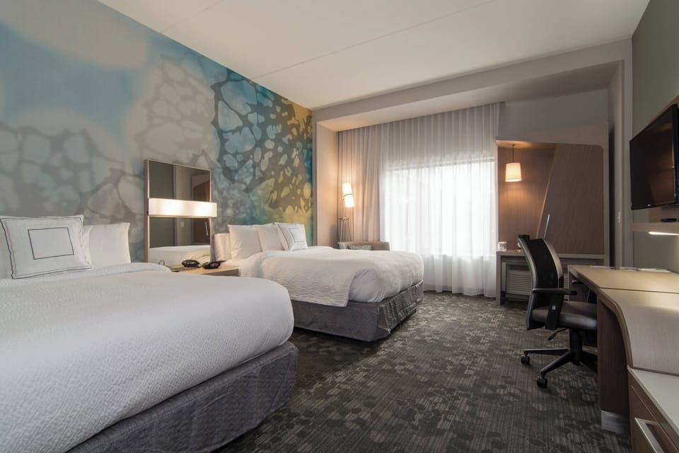 Room, 2 Queen Beds | In-room safe, desk, laptop workspace, blackout drapes