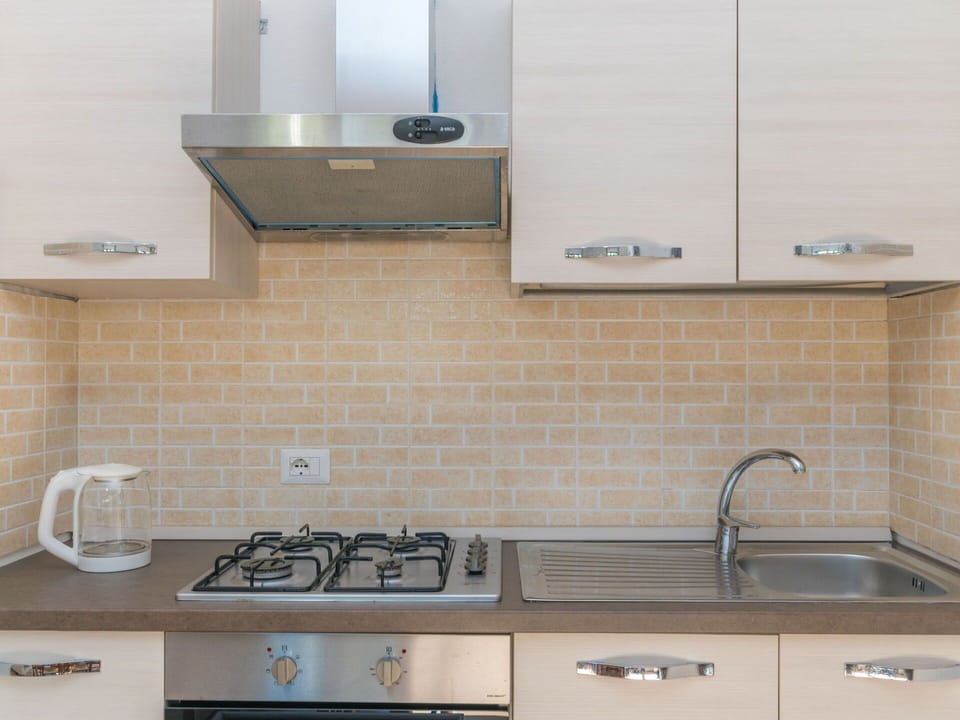 Kitchen Sink, Countertop, White, Cabinetry, Tap, Sink, Kitchen, Plumbing Fixture, Kitchen Stove, Lighting