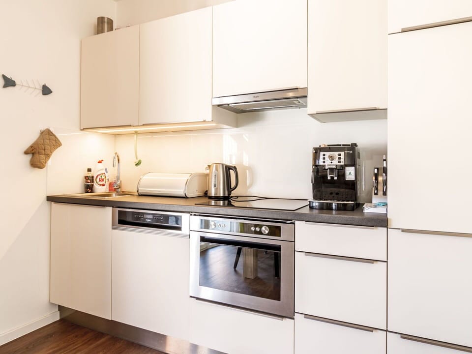 Cabinetry, Property, Countertop, Kitchen Appliance, Kitchen Stove, Kitchen Sink, Sink, Home Appliance, Kitchen, Interior Design