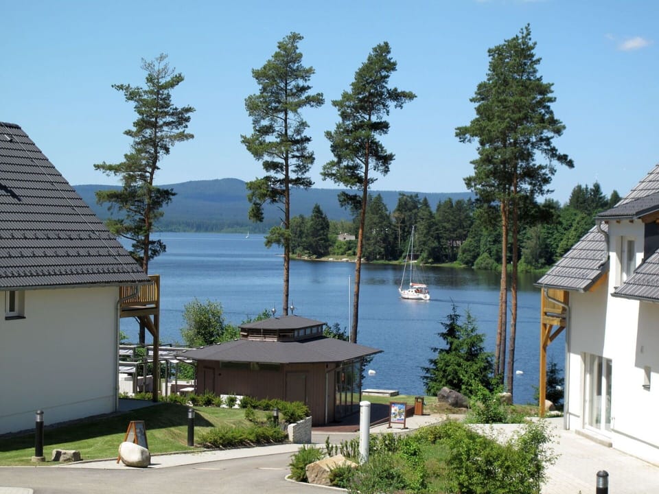Plant, Sky, Water, Building, Azure, Tree, Body Of Water, Shade, Lake, House