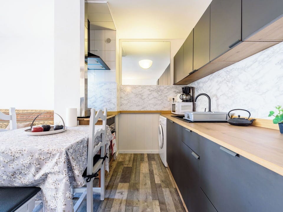 Kitchen, Countertop, Kitchen Appliance, Furniture, Interior Design, Flooring, Major Appliance, Wood, Cabinetry, Floor