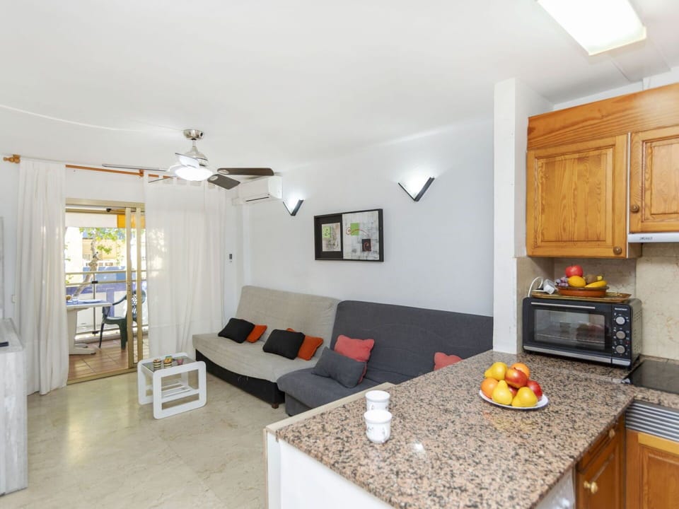 Property, Cabinetry, Table, Building, Couch, Lighting, Wood, Orange, Living Room, Home Appliance