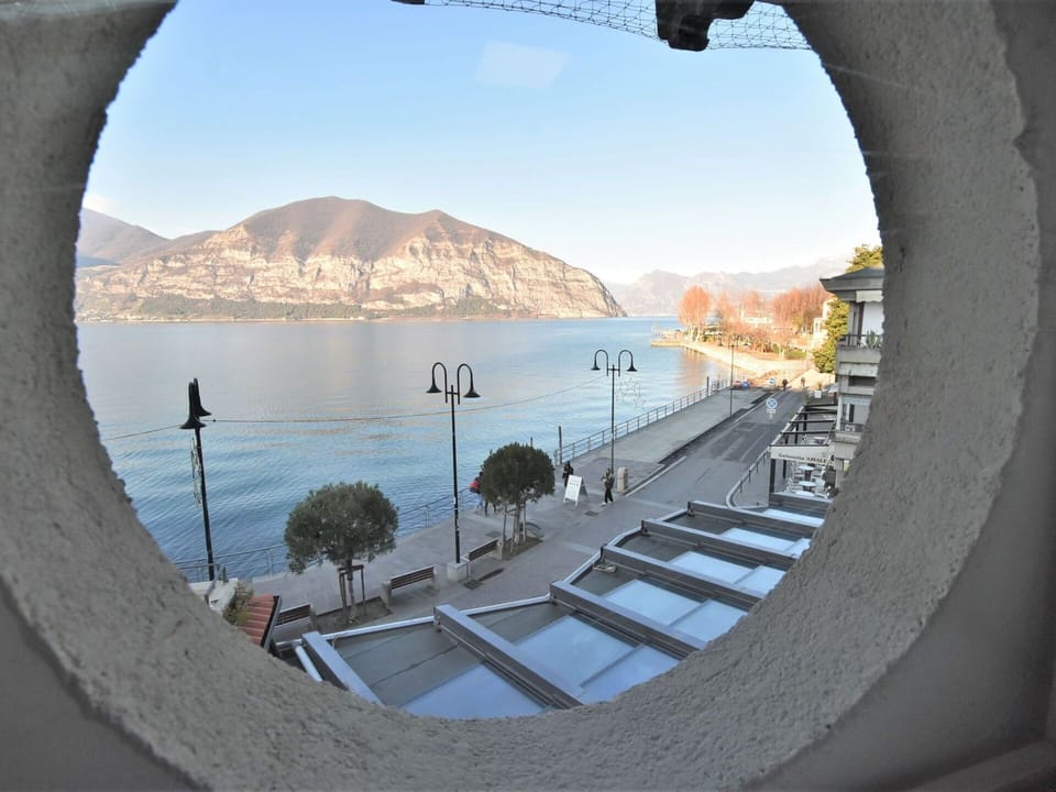 Water, Sky, Water Resources, Window, Mountain, Tree, Lake, Building, Shade, Landscape